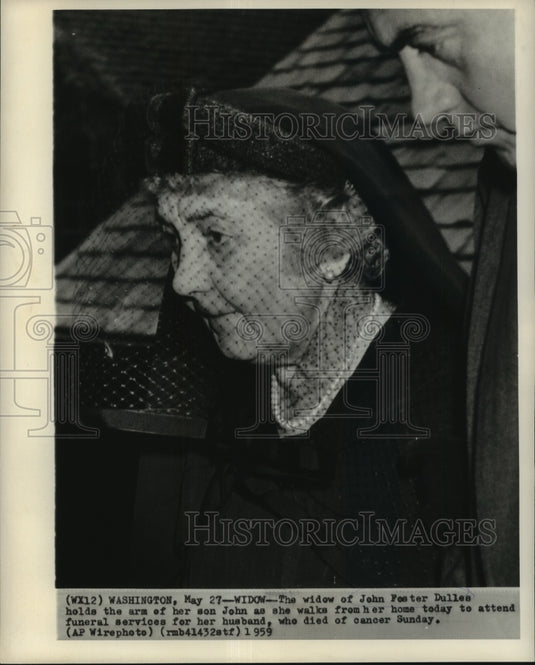 1959 Press Photo Widow of John Foster Dulles on sons' arm at funeral service