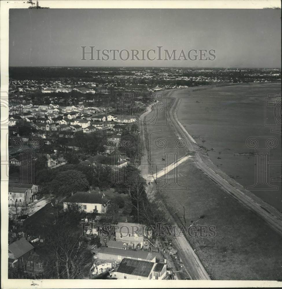 1963 Press Photo Levees hold back water at level higher than roofs in Carrollton