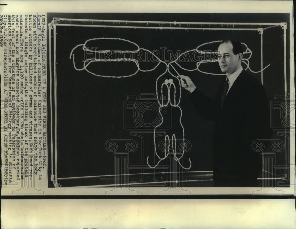 1969 Press Photo Professor Gerald Edelman shows structure of germ &amp; virus battle