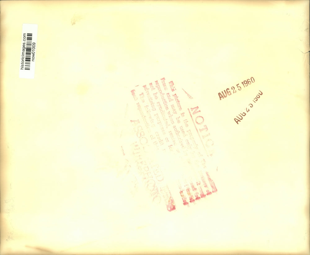 1960 Press Photo Hal Nixom stands in ashes of bunkhouse in Foresthill