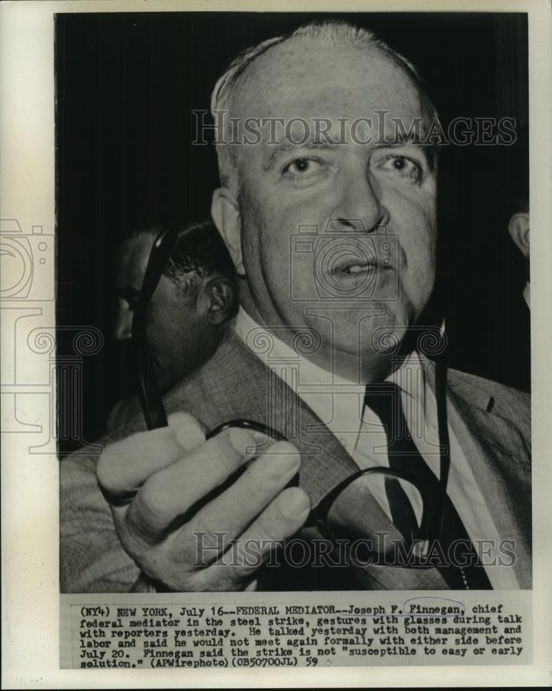 Load image into Gallery viewer, 1959 Press Photo Joseph Finnegan, steel strike mediator, with newsmen
