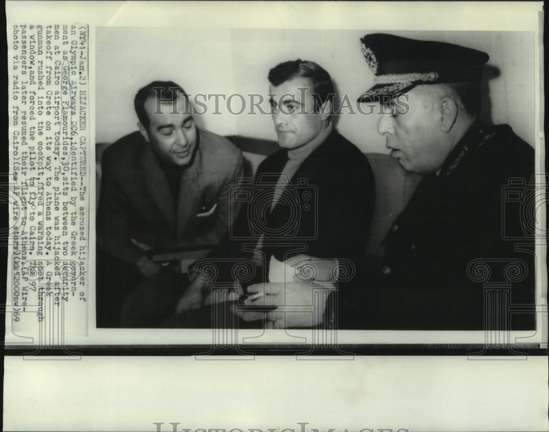 Load image into Gallery viewer, 1969 Press Photo George Flamourides, accused Olympic Airways hijacker, in Cairo
