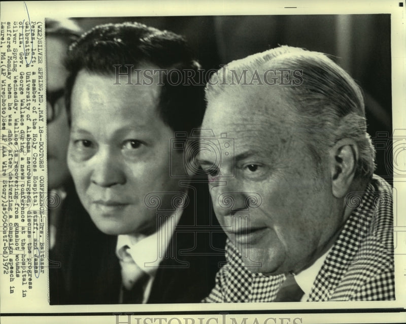 Load image into Gallery viewer, 1972 Press Photo Drs. Perez &amp; Galbraith discuss George Wallace recovery
