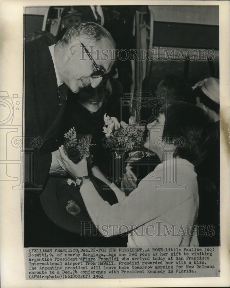 Load image into Gallery viewer, 1961 Press Photo Paulise Rosetti presents President Frondizi with one red rose
