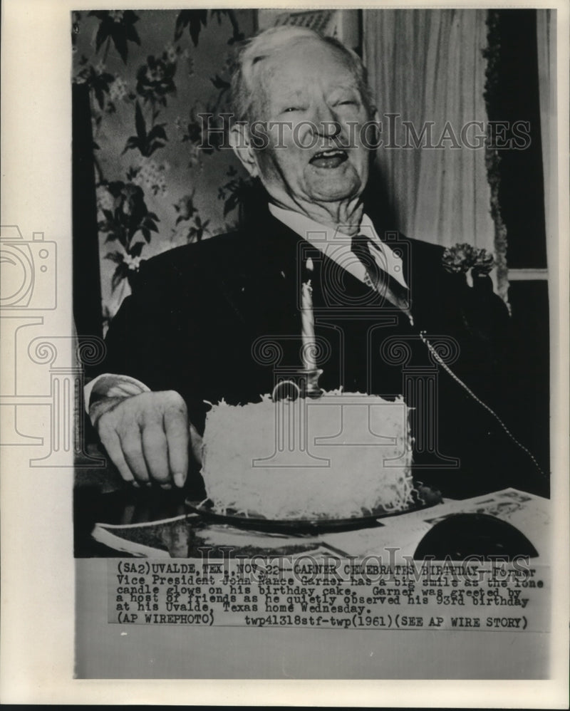 Load image into Gallery viewer, 1961 Press Photo Former Vice-President Garner laughs at cake candle on birthday
