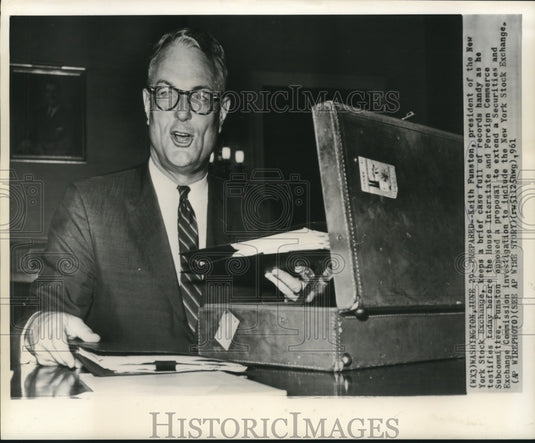 1961 Press Photo Keith Funston, Stock Exchange President, prepared with records
