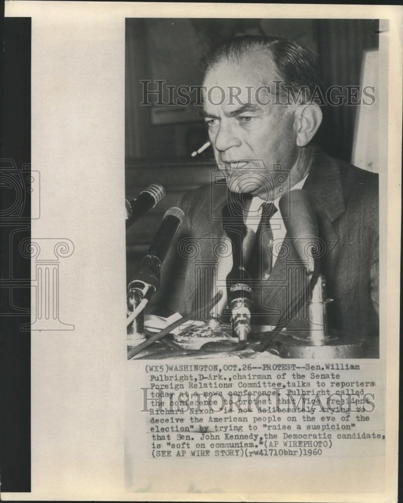 Load image into Gallery viewer, 1960 Press Photo Senator William Fulbright talks with reports at news conference
