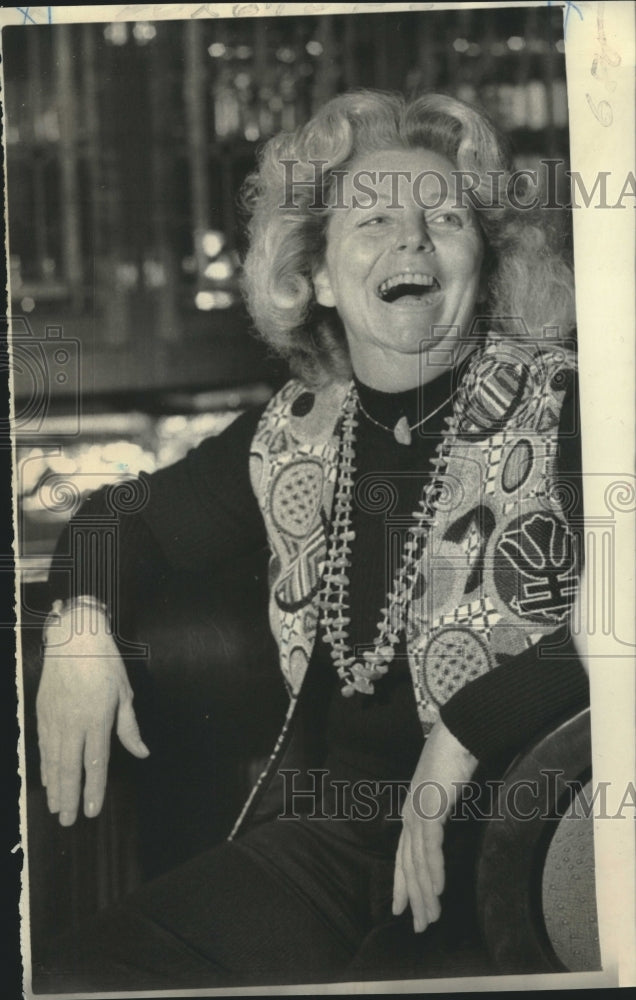 Press Photo Chicago coach's wife, Mrs. Abe Gribron laughing - now04690