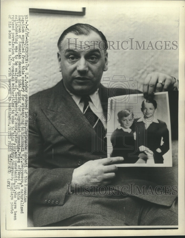 1953 Press Photo Blackmail victim V.C. Georgescu with photo of his two sons
