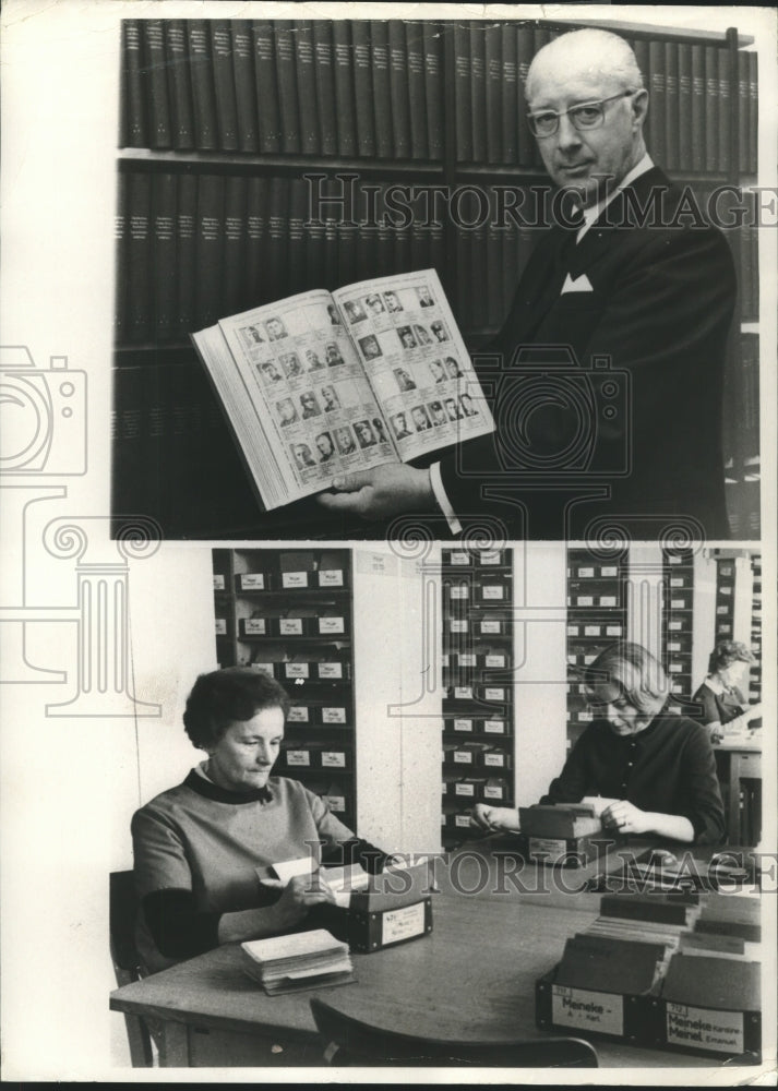Load image into Gallery viewer, 1970 Press Photo Workers of West German Red Cross tracing missing soldiers
