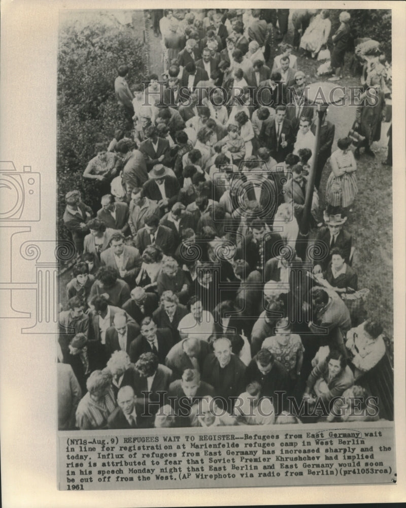 Load image into Gallery viewer, 1961 Press Photo East German refugees register at Marienfields refugee camp
