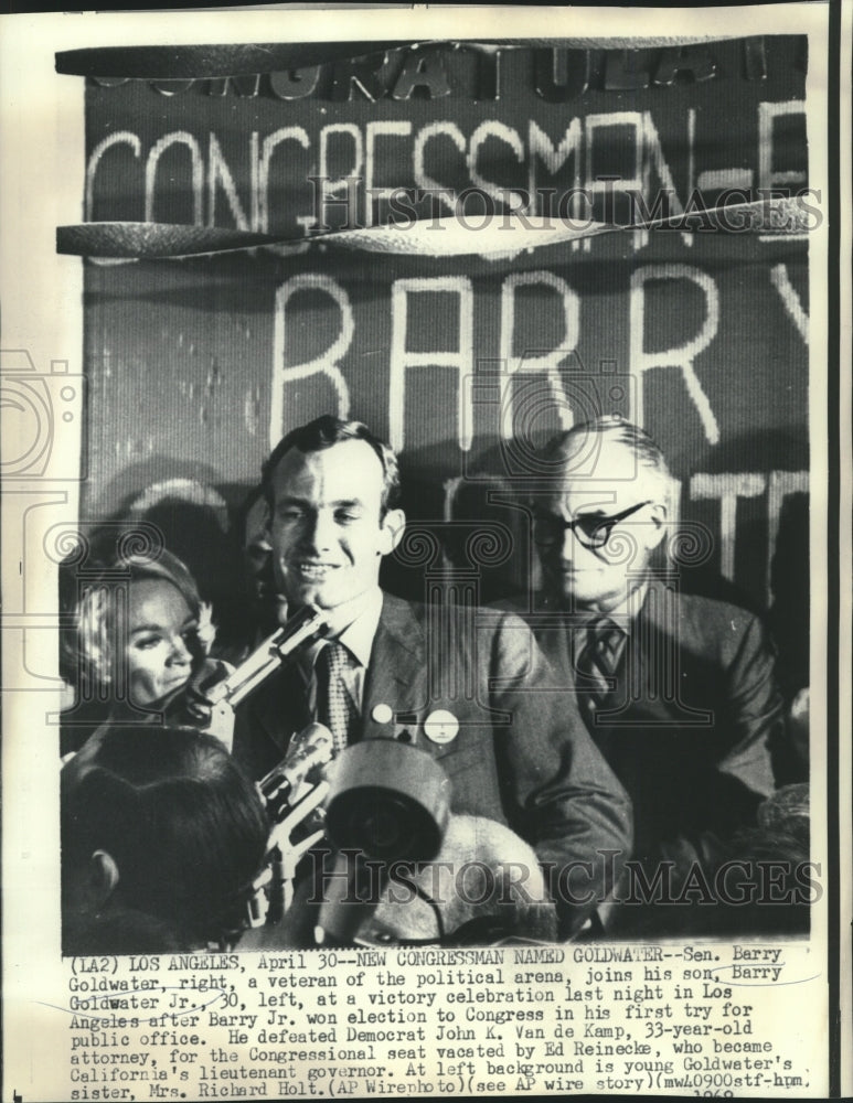 Load image into Gallery viewer, 1969 Press Photo Sen. Barry Goldwater joins son Barry, Jr. in election win

