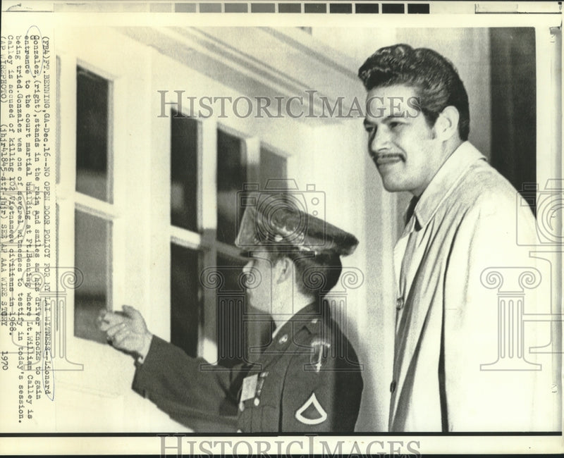 Load image into Gallery viewer, 1970 Press Photo Lionard Gonzalez waits at Ft. Benning's court martial building
