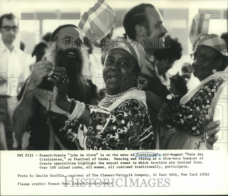 Load image into Gallery viewer, 1975 Press Photo Guadeloupe's mid-August "Fete des Cuisinieres," dining &amp; dance
