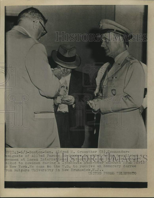 1963 Press Photo General Alfred Gruenther with newsmen at Logan Airport, Boston