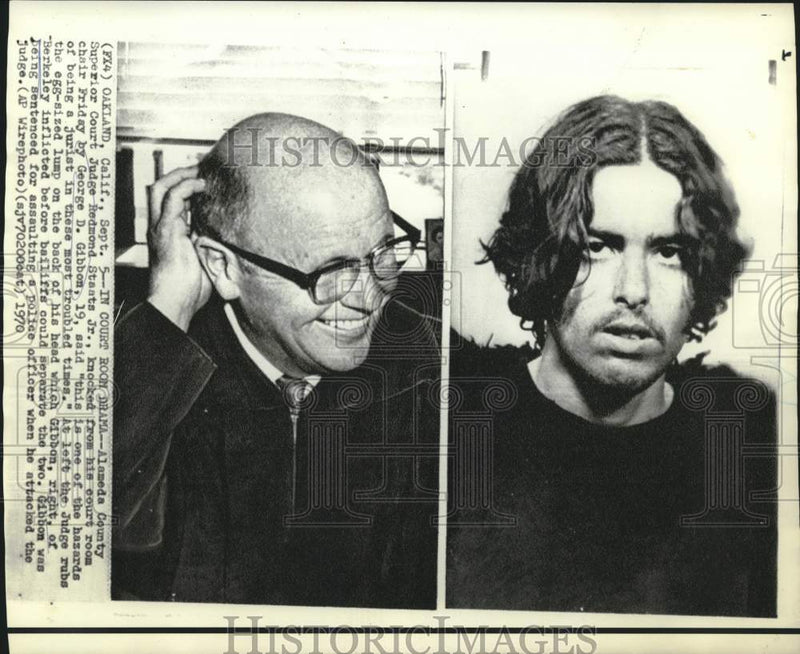 Load image into Gallery viewer, 1970 Press Photo Judge Staats, left, rubs injured head from assault by Gibbon
