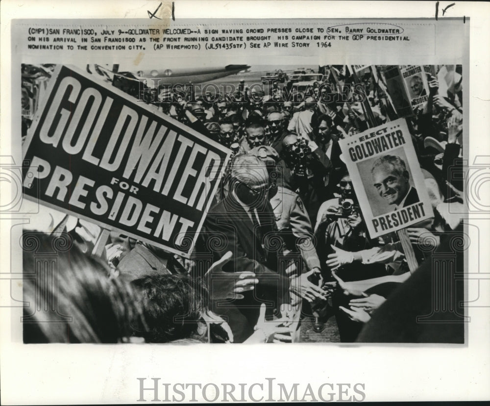 1964 Press Photo Sign waving crowd presses close to Senator Goldwater in CA