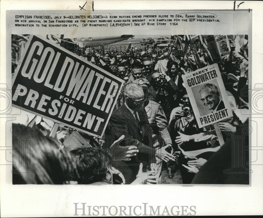 1964 Press Photo Sign waving crowd presses close to Senator Goldwater in CA