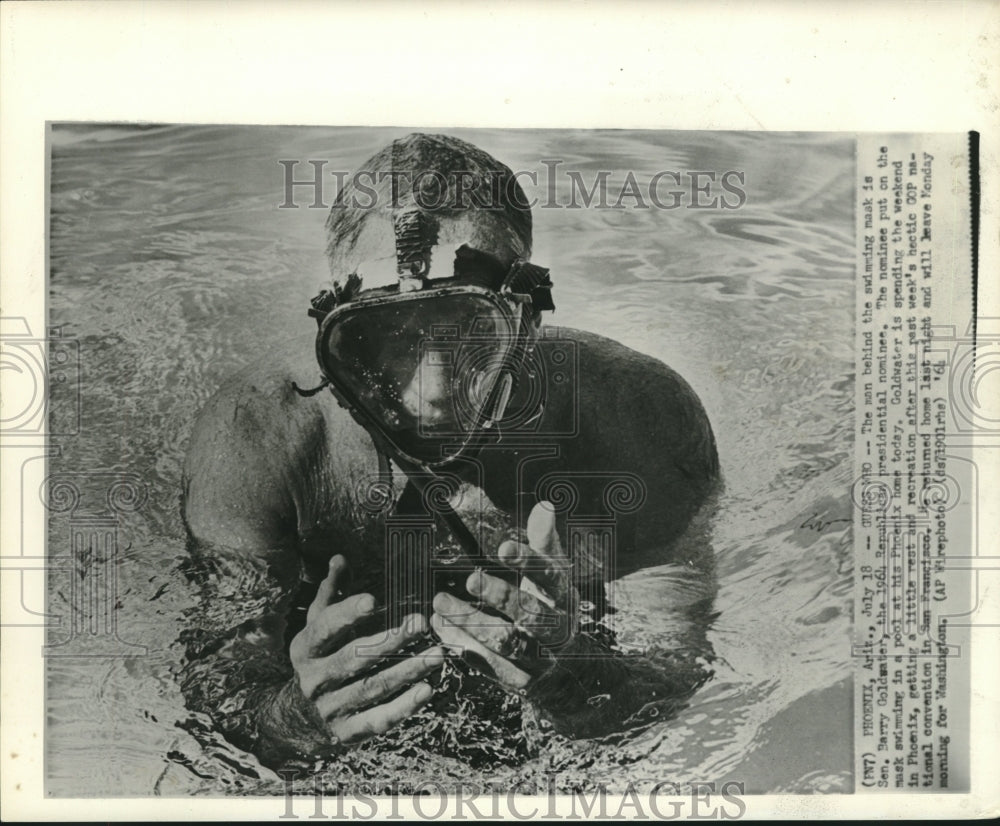 1964 Press Photo Senator Goldwater dons swimming mask in pool at Arizona home