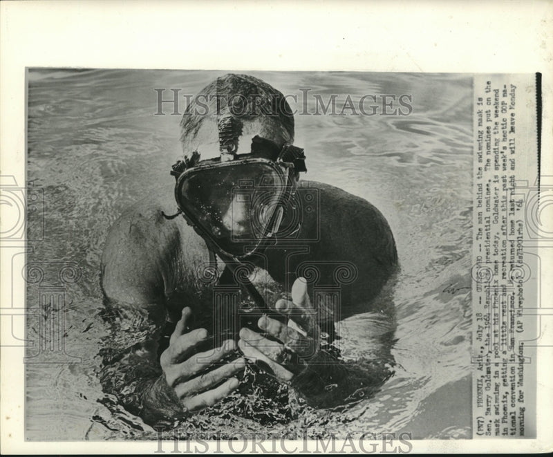 Load image into Gallery viewer, 1964 Press Photo Senator Goldwater dons swimming mask in pool at Arizona home
