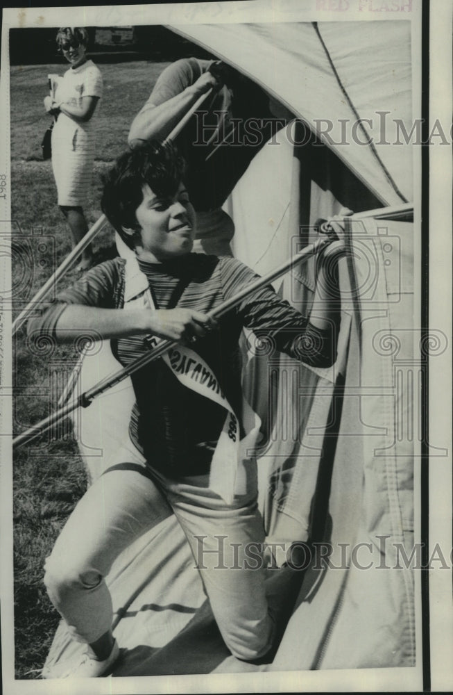 Load image into Gallery viewer, 1968 Press Photo Mrs. Pennsylvania, Mrs. Judith Gillis, assembling a tent
