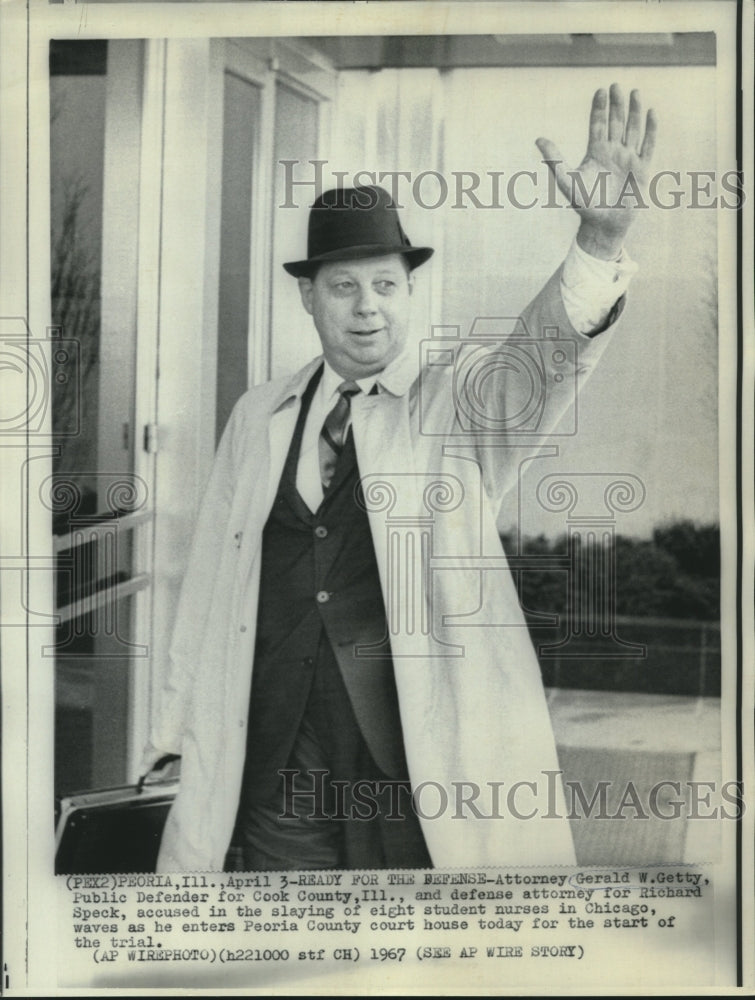 Load image into Gallery viewer, 1967 Press Photo Richard Speck's defense attorney Gerald Getty waves
