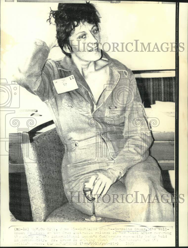Load image into Gallery viewer, 1975 Press Photo Germaine Greer, feminist, relaxes in Mexico City hotel room
