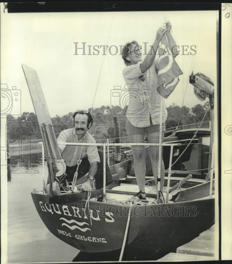 Load image into Gallery viewer, 1970 Press Photo Mr. &amp; Mrs. Matt Herron aboard Aquarius in Biloxi, Mississippi
