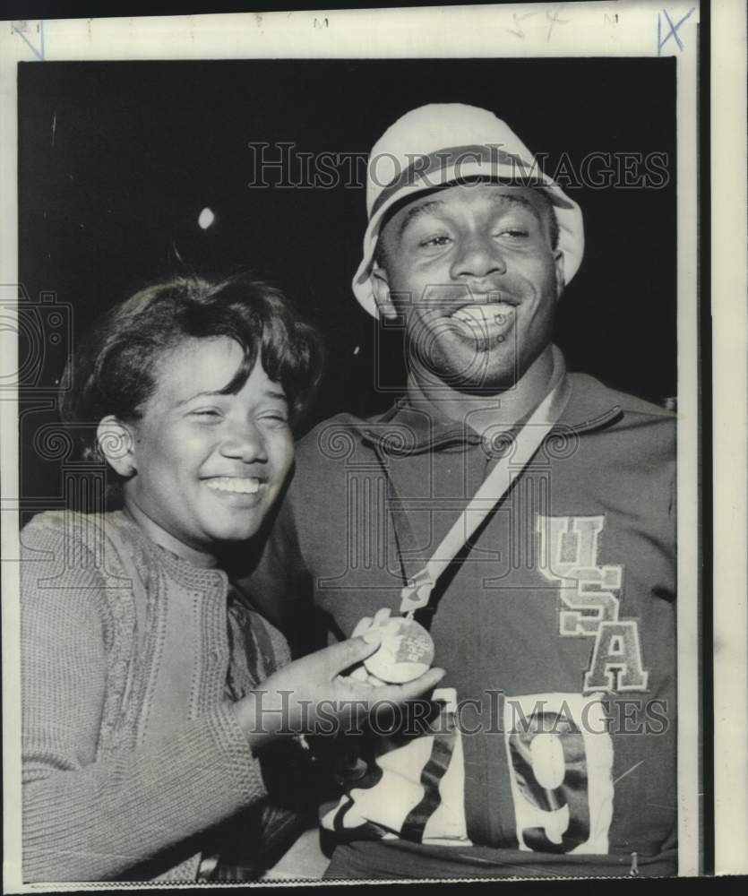 1968 Press Photo Joyce Hines shows husband Jimmy's gold Olympic Medal- Historic Images