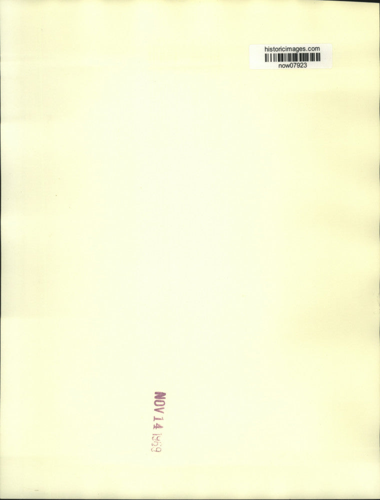 1963 Press Photo Astronaut Richard Gordon's son Larry folds newspapers