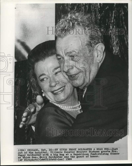 1964 Press Photo Senator Everett Dirksen gives Peggy Goldwater a hug in Chicago