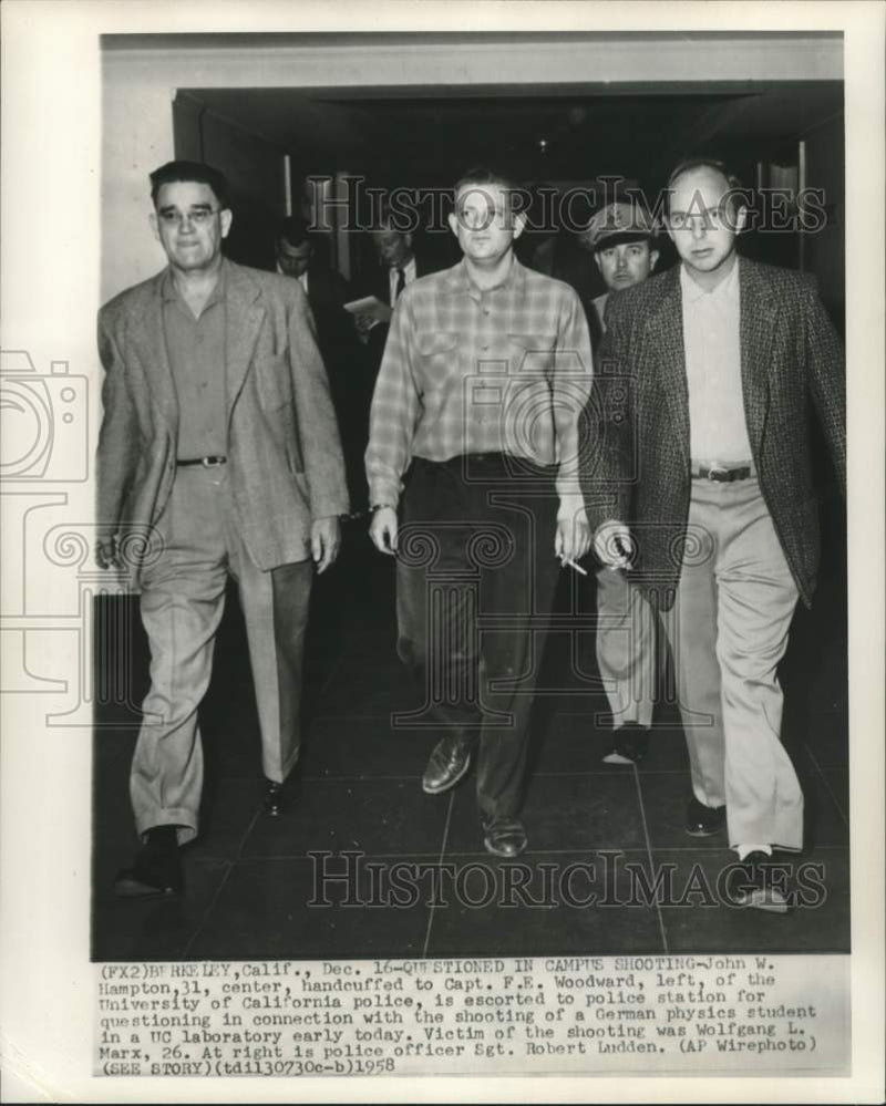 Load image into Gallery viewer, 1958 Press Photo John Hampton, handcuffed to Capt. Woodward, escorted from UC

