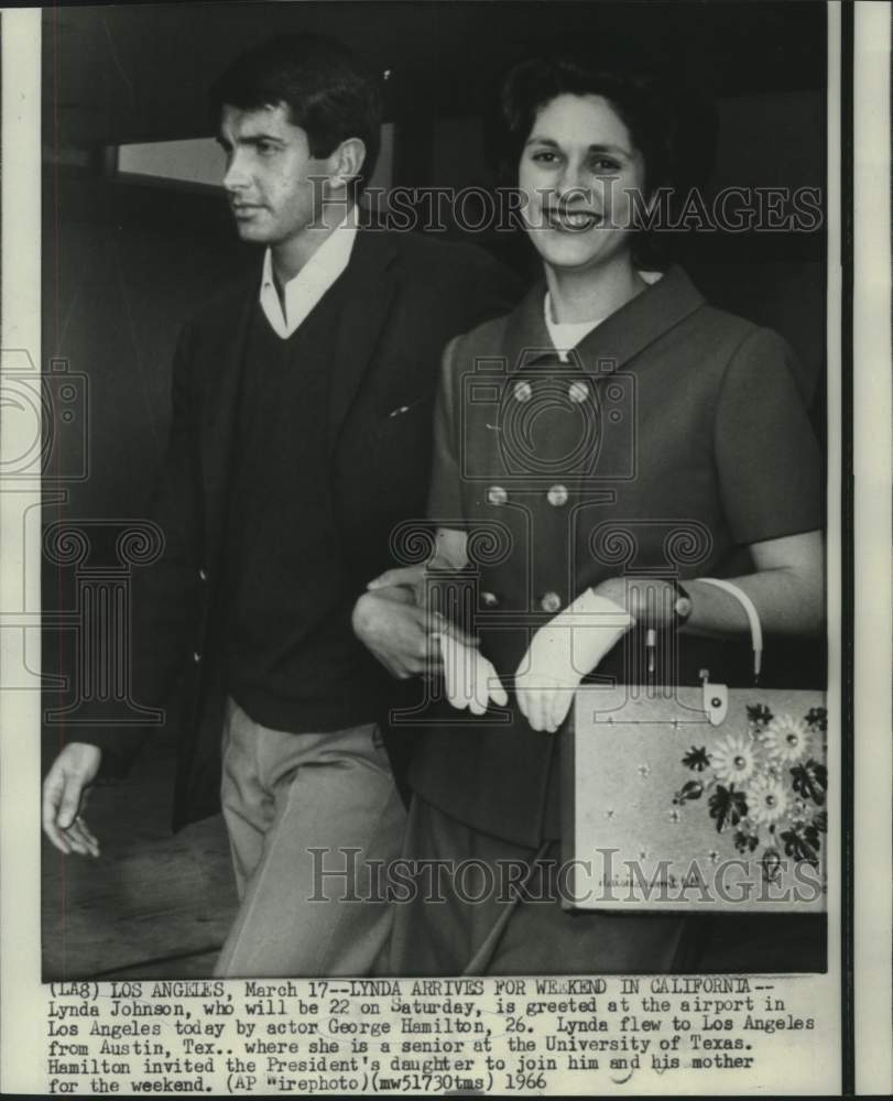 1966 Press Photo Lynda Johnson greeted at Los Angeles airport by George Hamilton