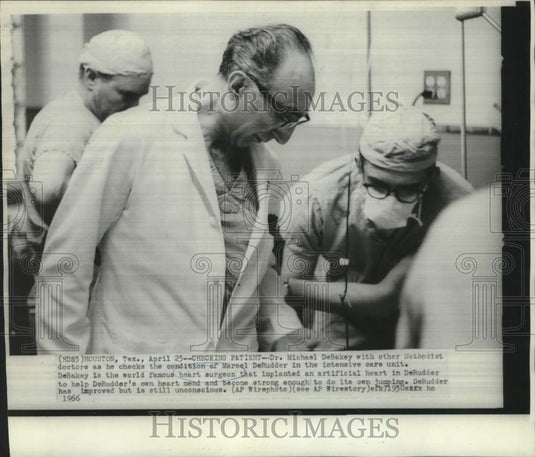 1966 Press Photo Dr. Michael DeRudder & others check paitient Marcel DeRudder