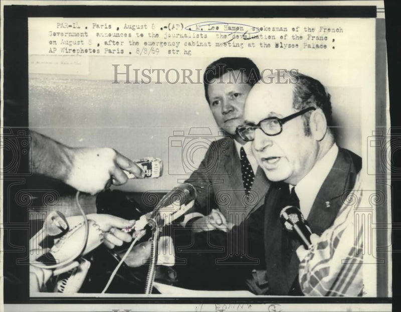 Load image into Gallery viewer, 1969 Press Photo M. Lee Hamon announces devaluation of Franc
