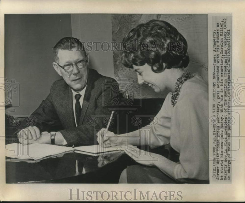 Load image into Gallery viewer, 1961 Press Photo James Hagerty, Vice President of ABC, with secretary.
