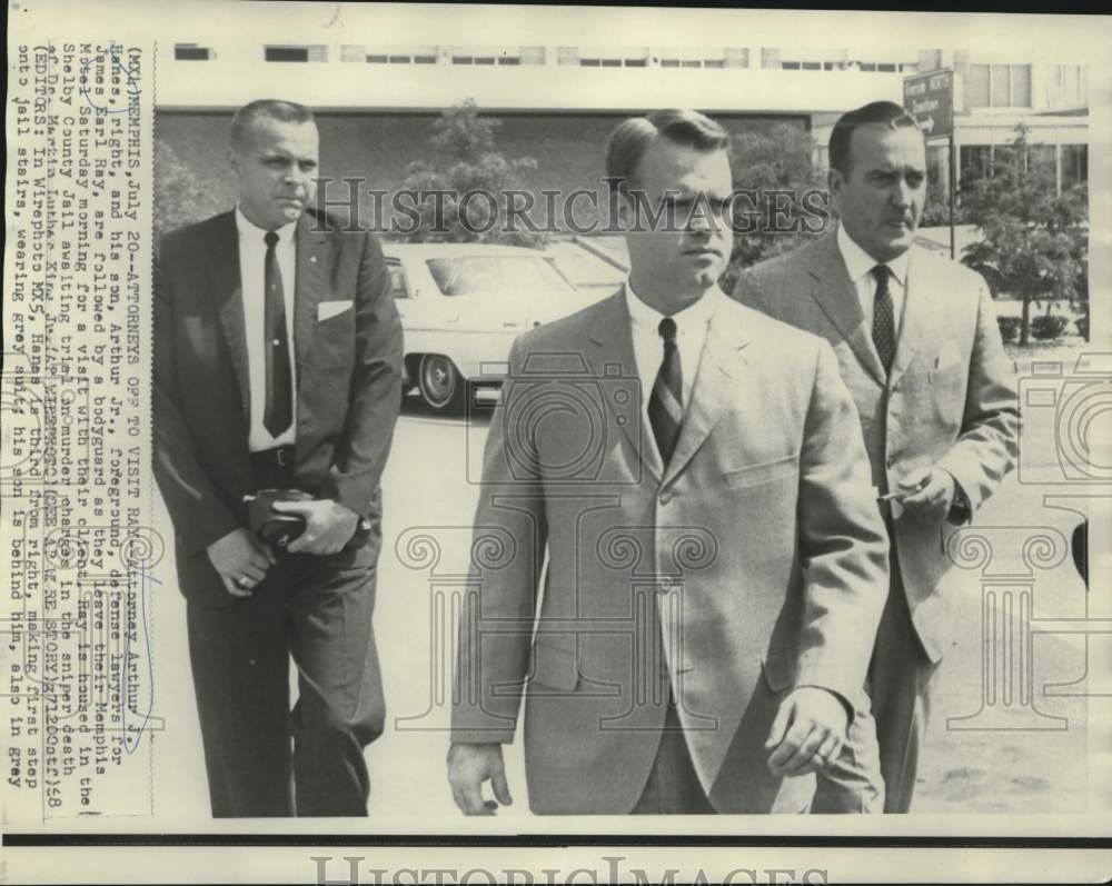 1968 Press Photo Attorneys Arthur J. Hanes and son, Arthur, Jr. leave motel room