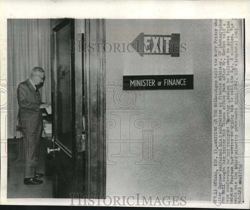 Load image into Gallery viewer, 1965 Press Photo Canadian Finance Minister Walter Gordon in his Ottawa office
