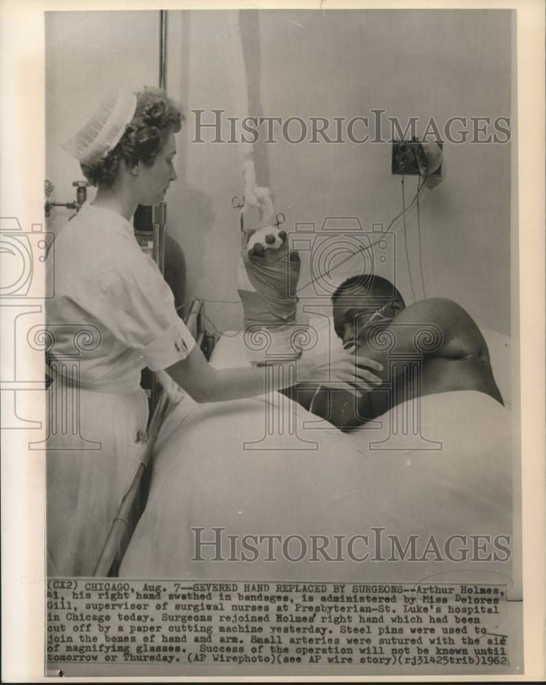 Load image into Gallery viewer, 1962 Press Photo Arthur Holmes aided by Delores Gill in Chicago hospital
