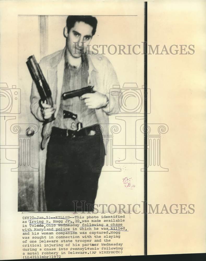 Press Photo Irving R. Hogg, Jr., shown with numerous weapons - now11678