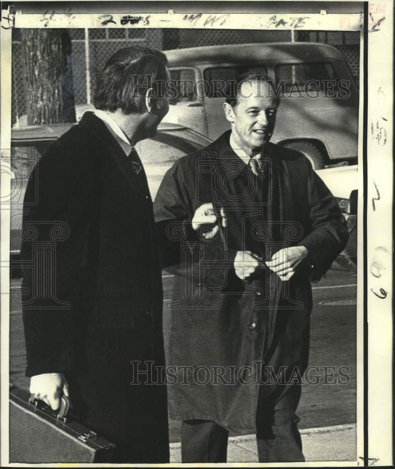 Load image into Gallery viewer, 1973 Press Photo E. Howard Hunt accompanied by attorney Bittman in Washington
