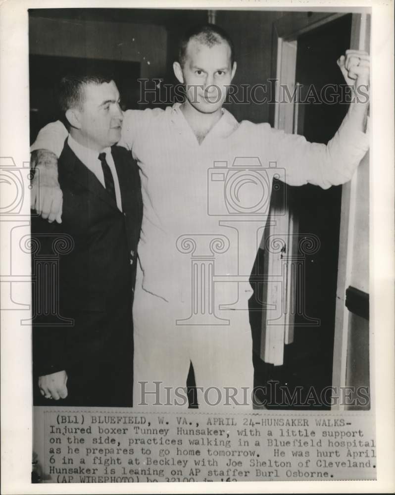 1960 Press Photo Injured boxer Hunsaker practices walking at Bluefield Hospital