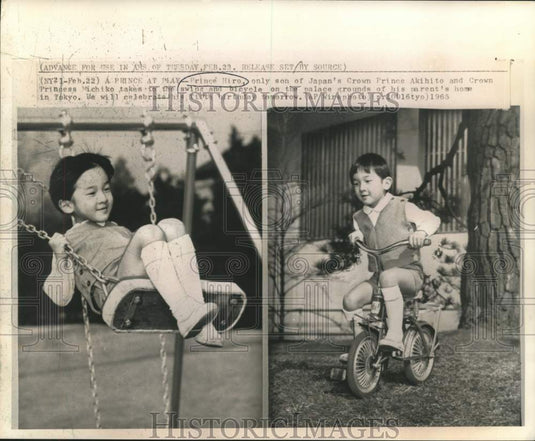 1965 Press Photo Prince Hiro plays on swing and bicycle on Tokyo palace grounds