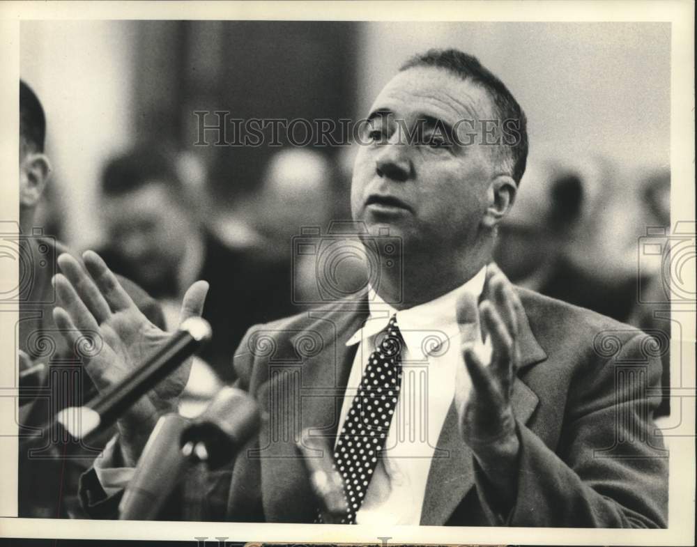 1956 Press Photo Orville Hodge testifies a. Senate Banking Committee hearing