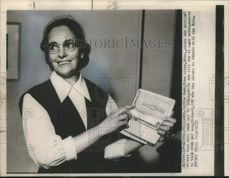 Load image into Gallery viewer, 1953 Press Photo Portia Howe of Minnesota with ticket to Tokyo for POW son
