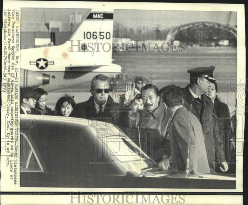 Load image into Gallery viewer, 1970 Press Photo South Vietnam's Nguyen Cao Ky waves on arrival to Andrews AFB.
