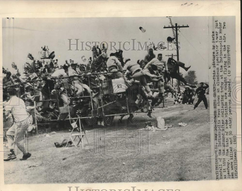 Load image into Gallery viewer, 1960 Press Photo Collapsing Indianapolis Speedway spectator tower. - now13890
