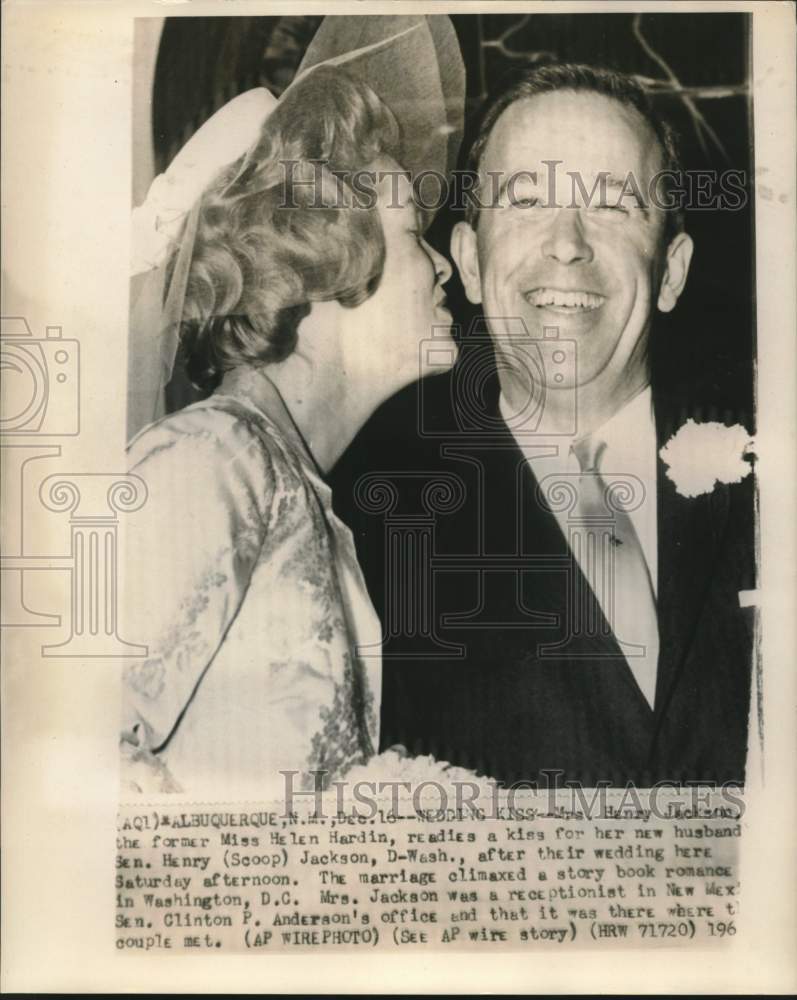 Load image into Gallery viewer, 1961 Press Photo Mrs. Henry Jackson kisses husband Senator Jackson after wedding
