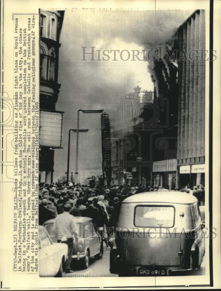1969 Press Photo Firemen fight blaze on Royal Avenue in Belfast, Northern Irelan