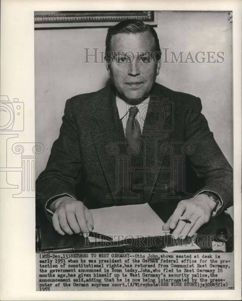 1953 Press Photo Otto John shown at desk in West Germany - now14896